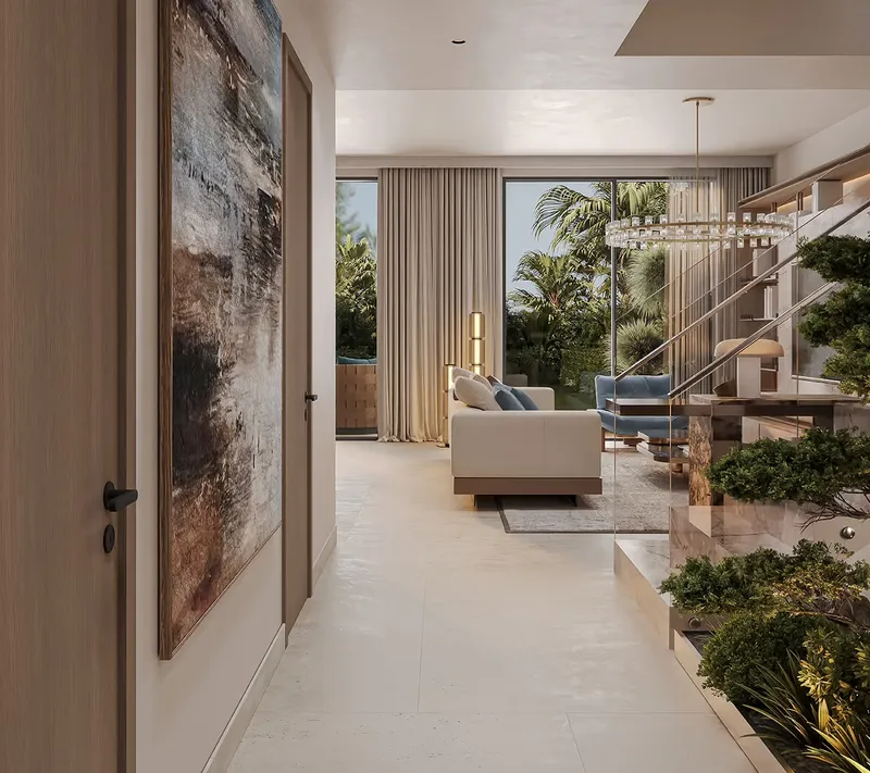 Villa entrance hall leading to a living room with garden views