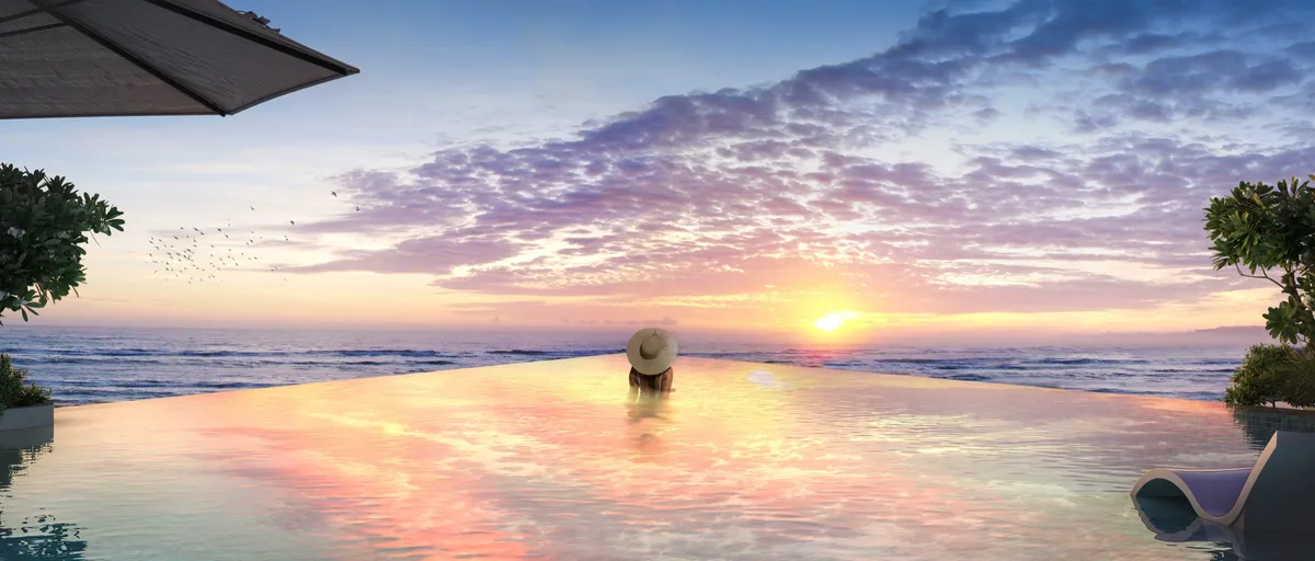 Render of the adults-only infinity pool at Mar Casa looking out over the sea at sunset