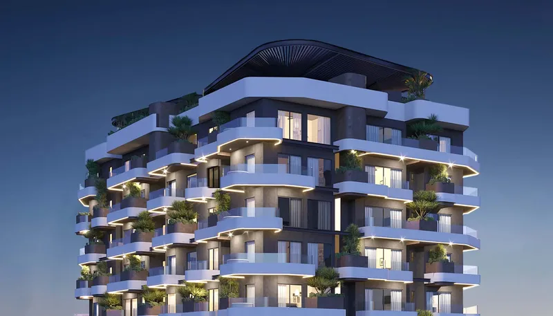Night render of the upper floors and rooftop of Marea Residences