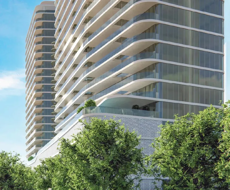 Curved balconies and glazing of the Marlin II facade above the podium (developer render)