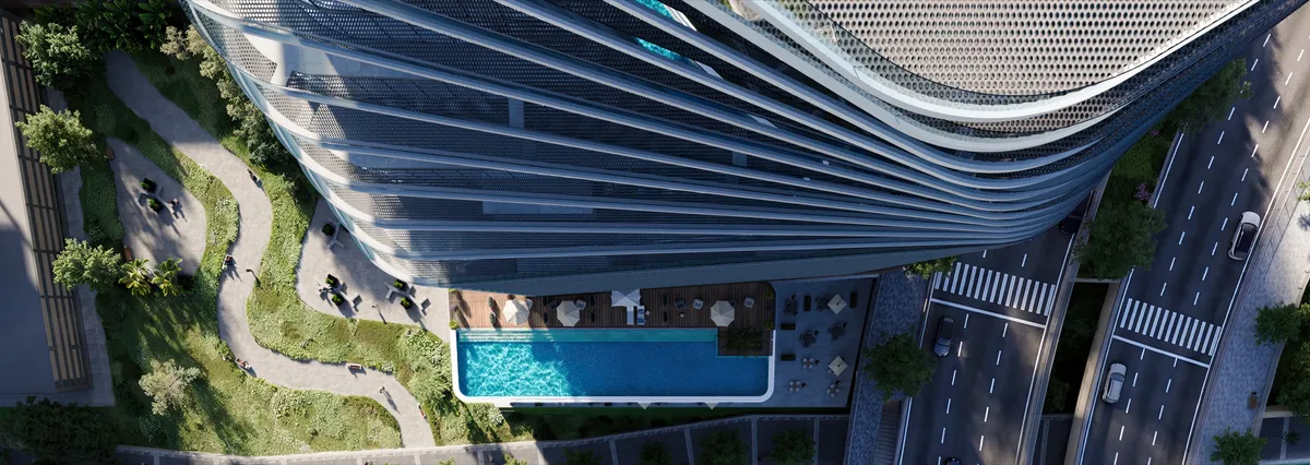 Aerial view of the Marlin Icon podium pool deck beside the curved tower (developer render)
