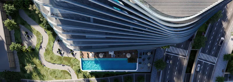 Aerial view of the Marlin Icon podium pool deck beside the curved tower (developer render)