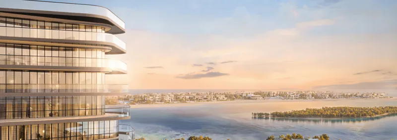 Curved upper floors of Marlin Icon looking over the water towards Abu Dhabi at sunset (developer render)