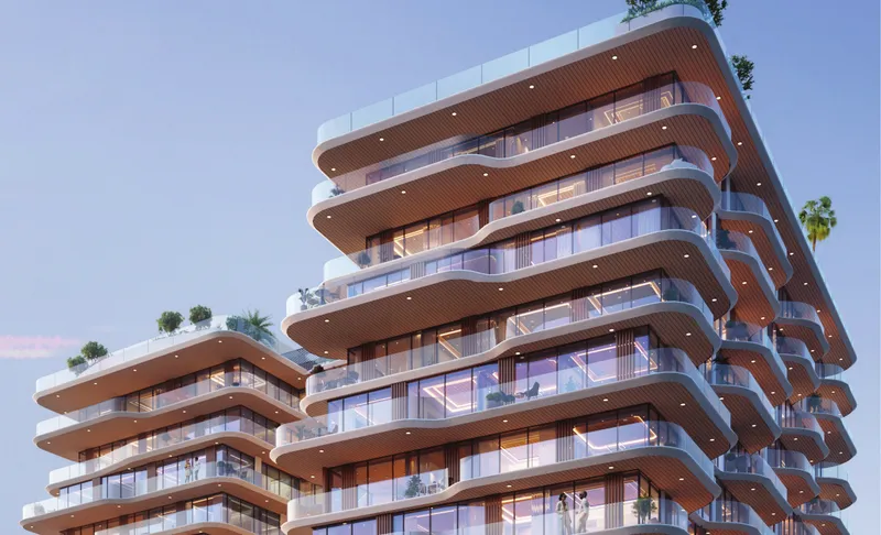 Close view of the curved, stepped balconies on the upper floors of Marquis Horizon