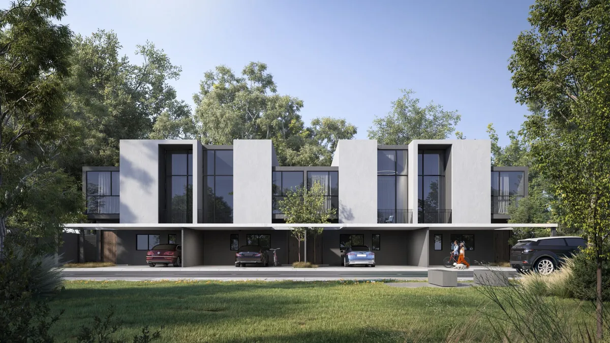 Render of a street of townhouses at Dalia, Masaar 3, at dusk
