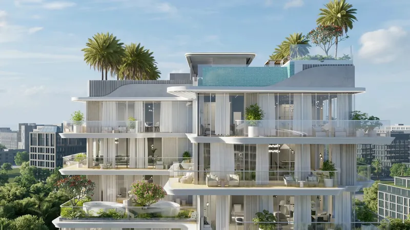 Upper floors of Meriden Beach Residences with wide curved balconies and a glass-edged rooftop pool