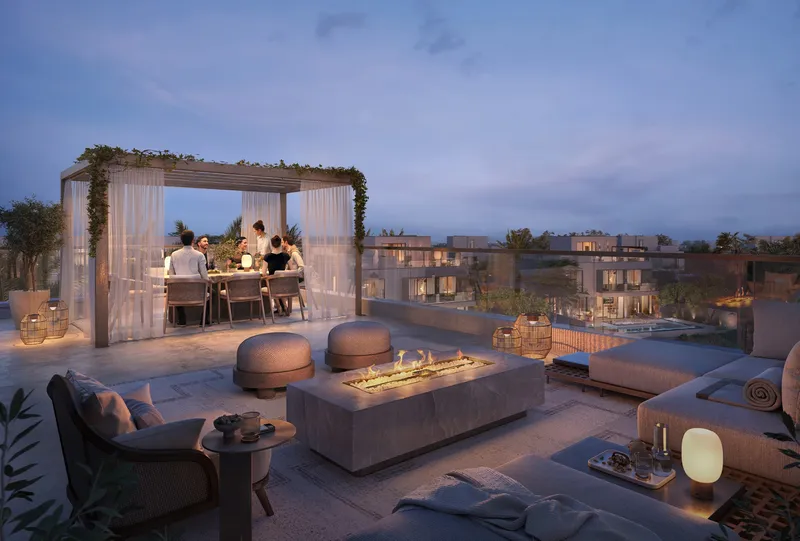 Render of a Mirage villa roof terrace with a fire table, lounge seating and a shaded dining pergola