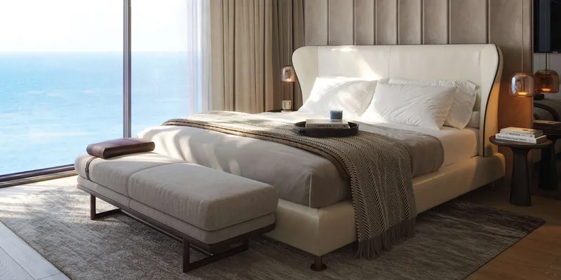 Render of a bedroom facing the sea in a Mirasol II apartment