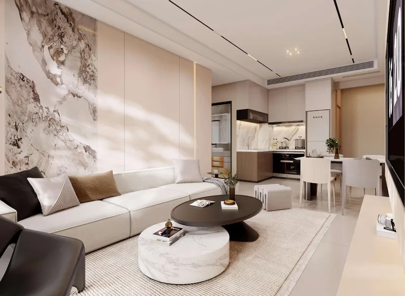 Render of a furnished living room and open kitchen at Nest Residence