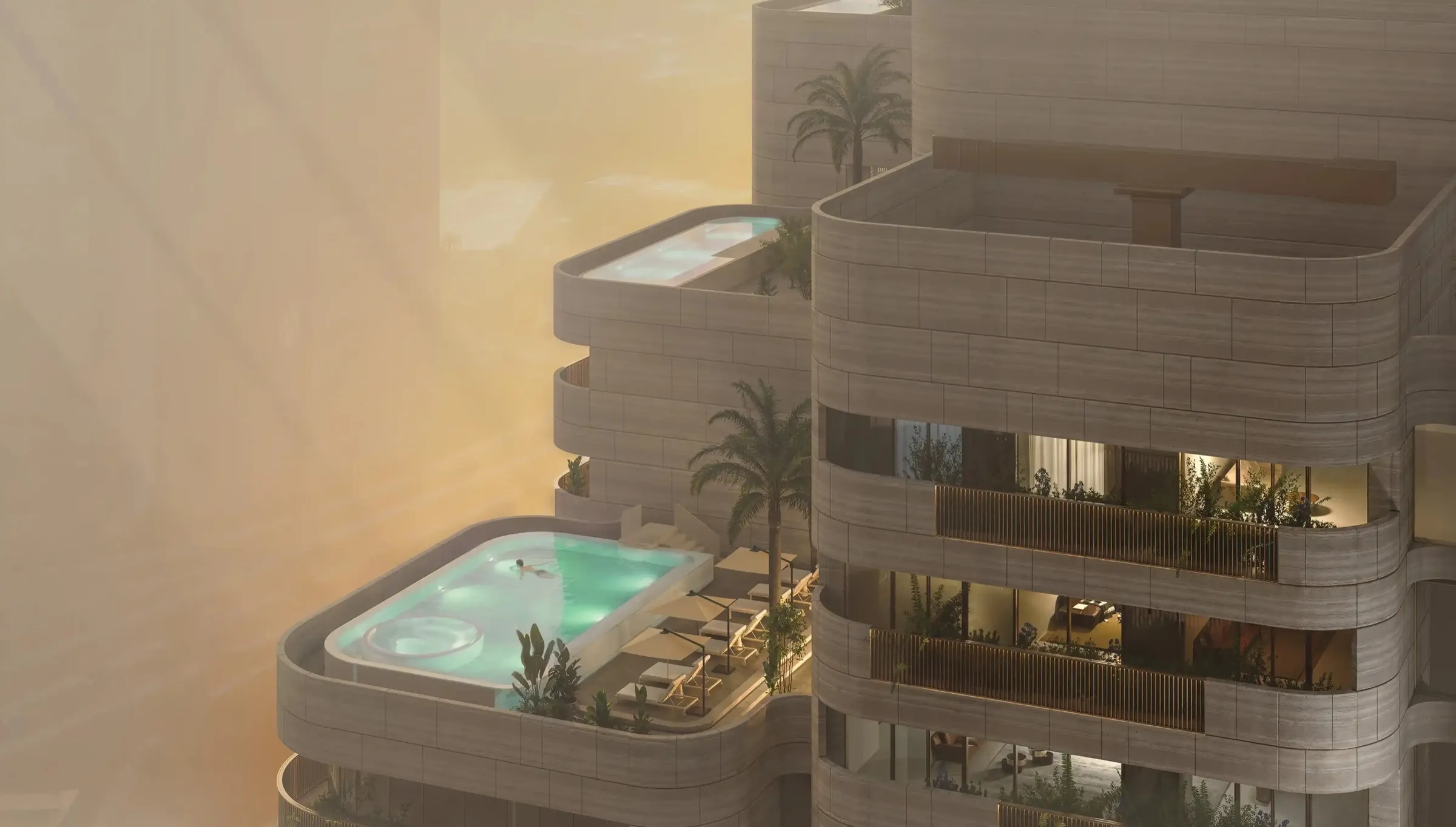 Stepped rooftop terraces with pools at the top of Nine Collective at sunset
