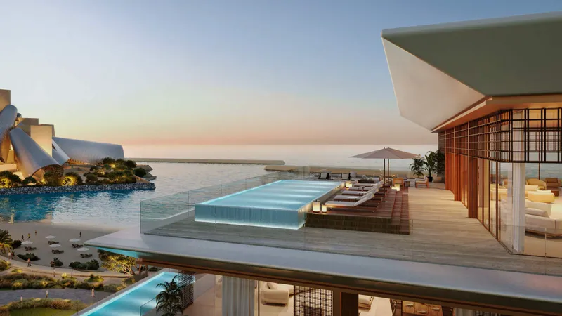 Rooftop terrace with a glass-edged pool looking over the sea towards Guggenheim Abu Dhabi
