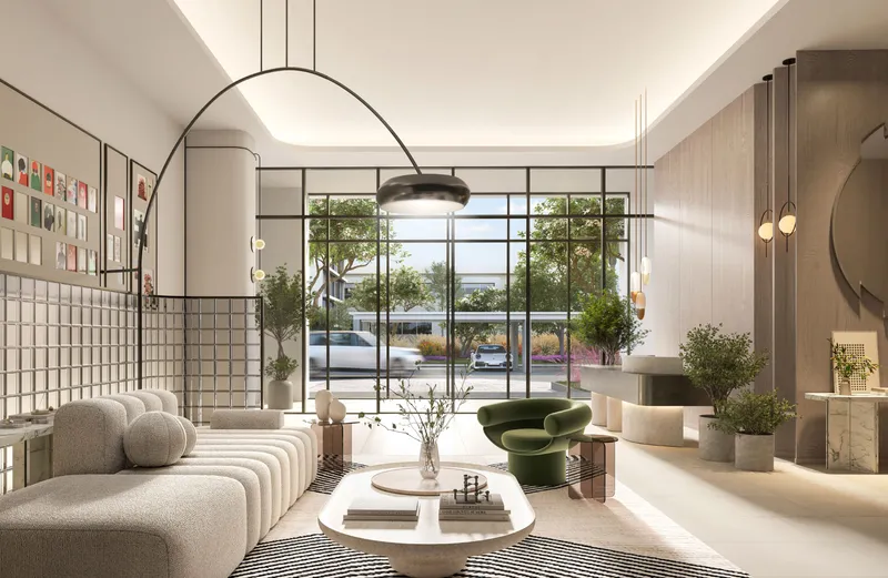 Interior render of the Ocean Cove lobby lounge with seating and tall glazed doors
