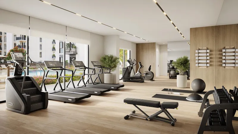 Render of the gym at Olbia with treadmills and weights facing windows onto the pool