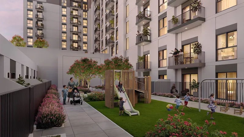 Render of a lawn with a wooden play tower and slide in the courtyard at Olbia
