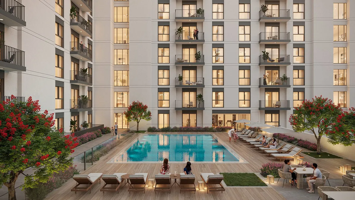 Render of the swimming pool at Olbia with sun loungers and seating, framed by the building's balconies