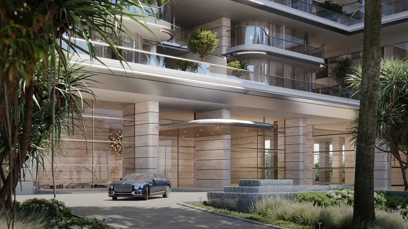 Render of the stone-clad arrival court and entrance canopy at ORLA