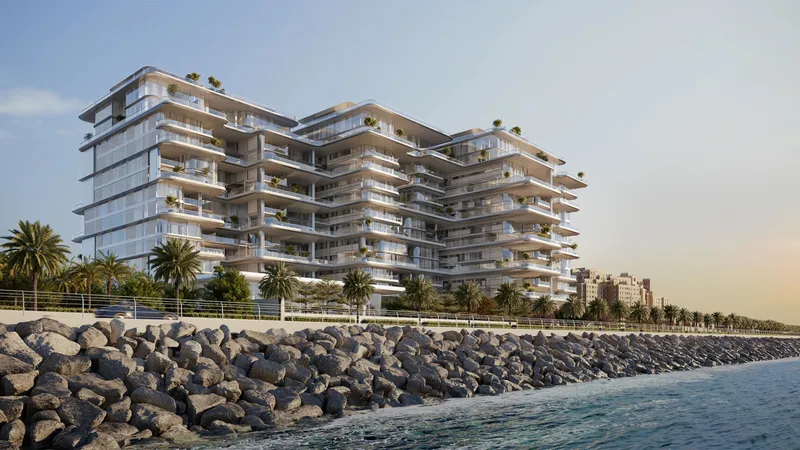 Render of ORLA's linked, terraced buildings seen from the sea on the Palm Jumeirah crescent