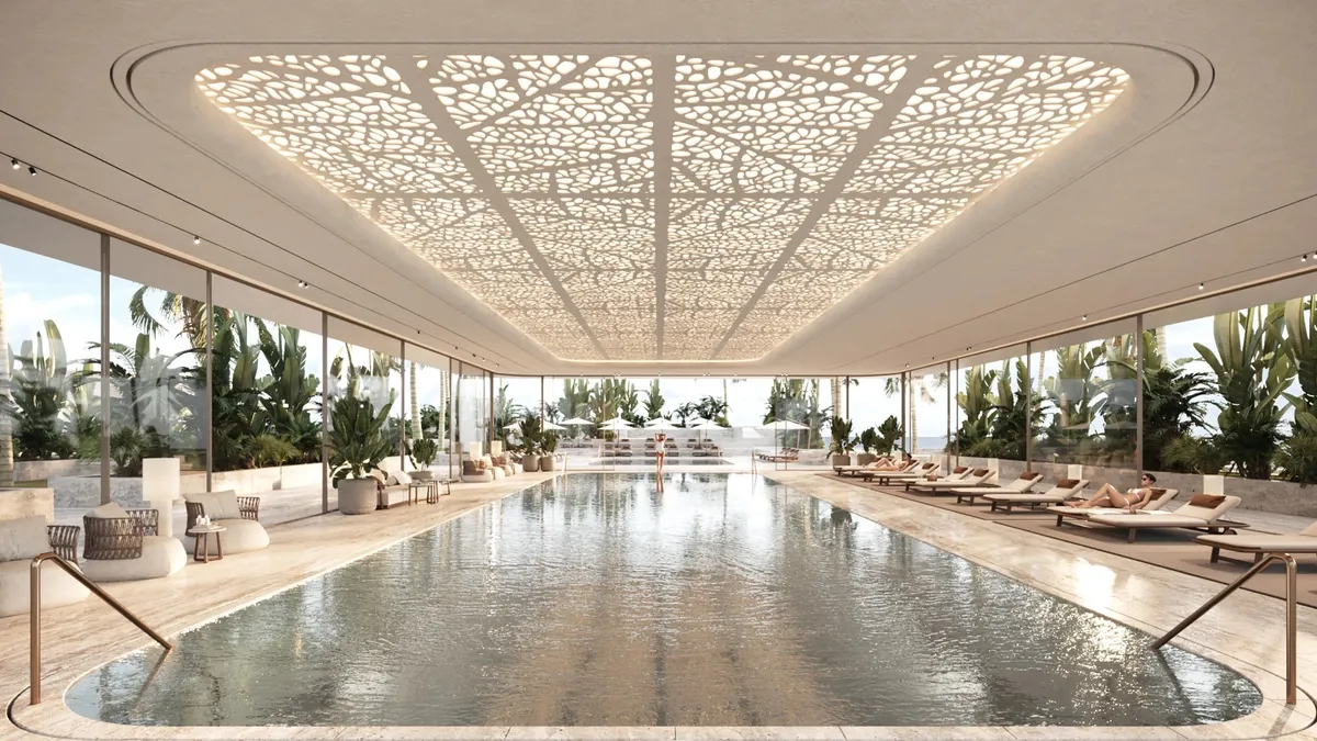 Render of the indoor lap pool at ORLA under a patterned, back-lit ceiling