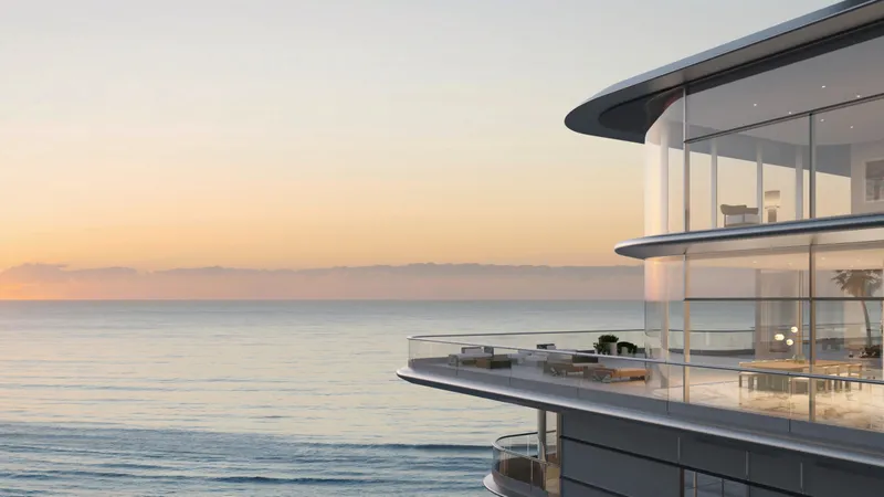 Render of the curved glass corner of the Luna Sky Palace at ORLA above the Arabian Gulf at sunset