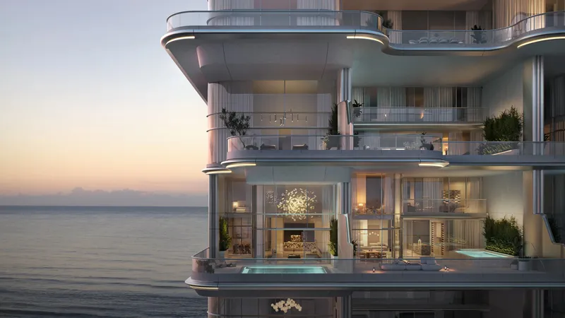 Render of ORLA's sea-facing terraces and private pools at dusk