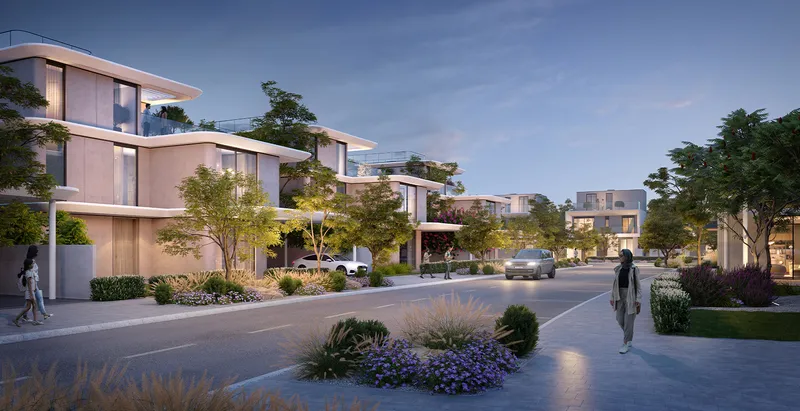 Render of a tree-lined street of Park Gate 2 villas at dusk