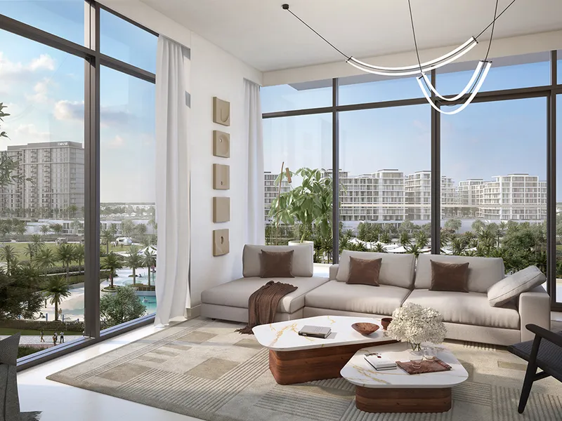Living room at Parkside Views with corner floor-to-ceiling windows facing the park