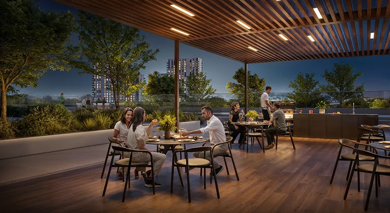 Render of residents dining under a timber pergola in the Parkwood BBQ and dining area
