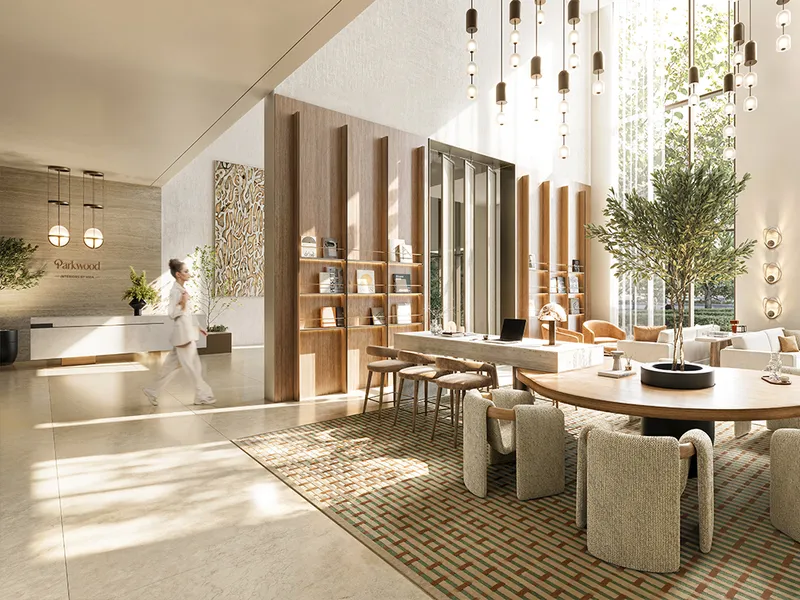 Interior render of the double-height Parkwood lobby with reception desk and seating