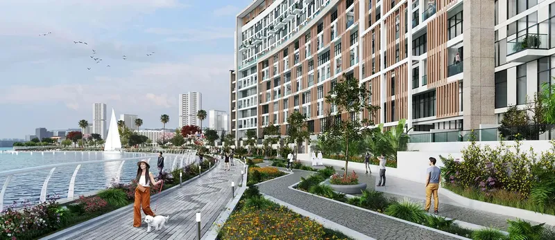 Landscaped waterfront promenade running beside Perla 2 on Yas Bay (developer render)