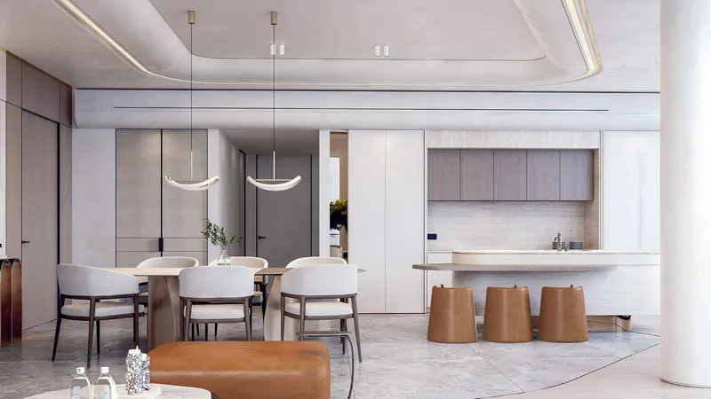 Render of the dining area and kitchen in a three bedroom home at Quattro Del Mar