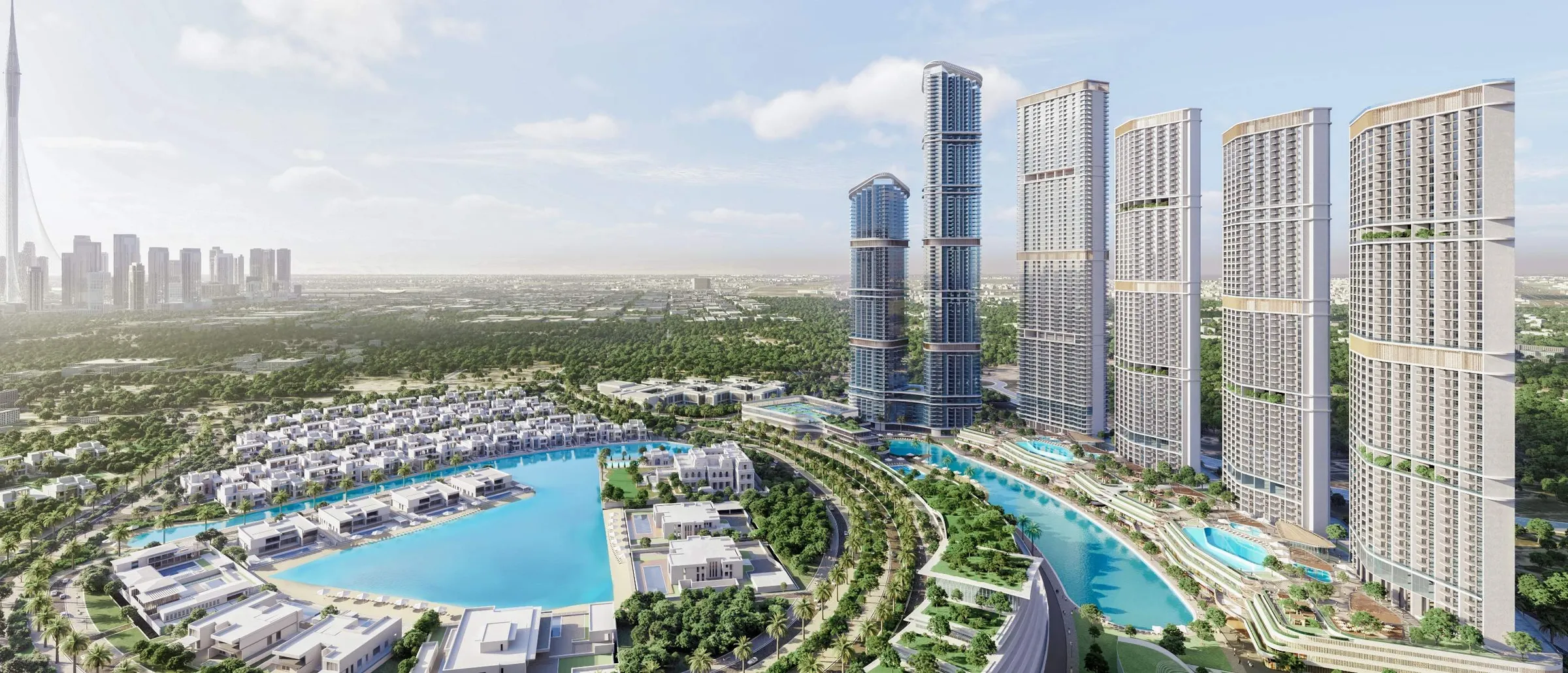 Aerial view of the Riverside Crescent towers standing in a row beside the lagoon at Sobha Hartland II