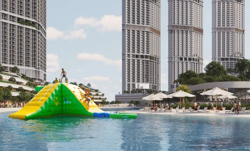 Inflatable water obstacle course on the lagoon in front of the Riverside Crescent towers