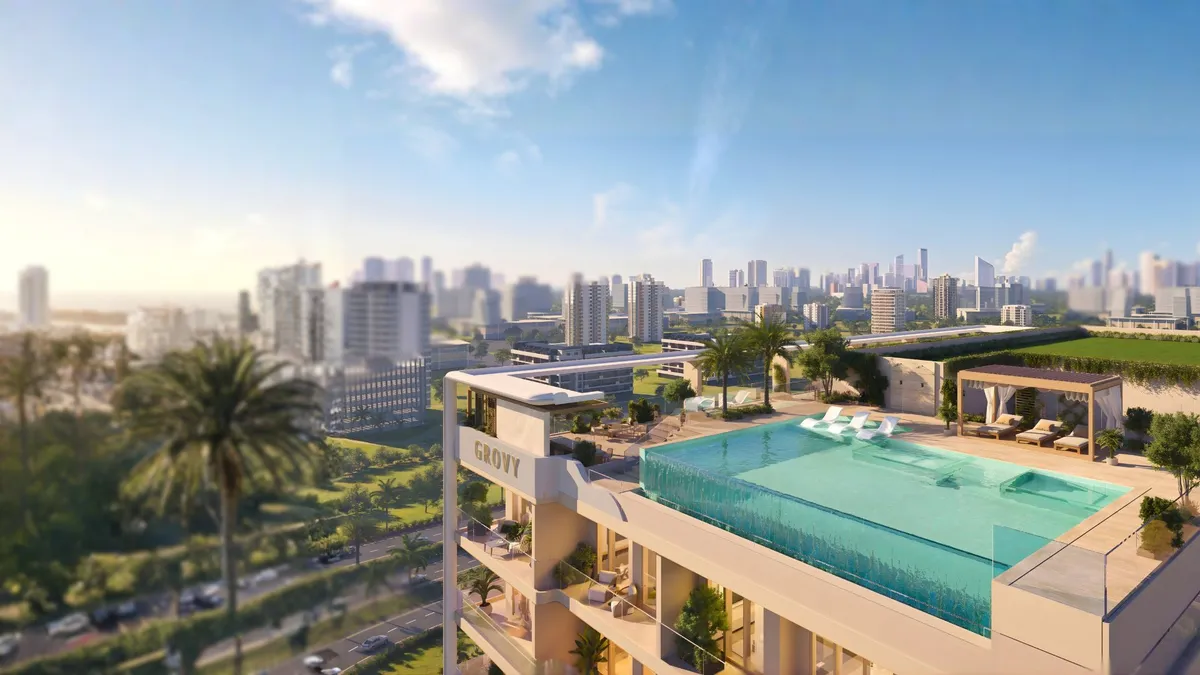 Render of the rooftop infinity pool at RIVO by Grovy with a glass edge, overlooking Dubailand