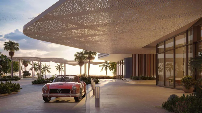 Covered arrival court with a perforated canopy and palm trees at Rosso Bay Residences