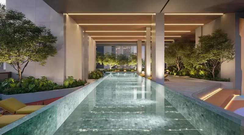 Covered lap pool with timber ceiling and planting at Rove Home Downtown Dubai