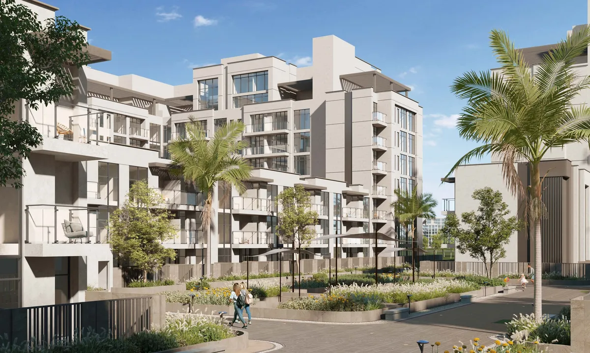 Royal Park apartment buildings in Masdar City, Abu Dhabi, around a landscaped courtyard street with palm trees (developer render)