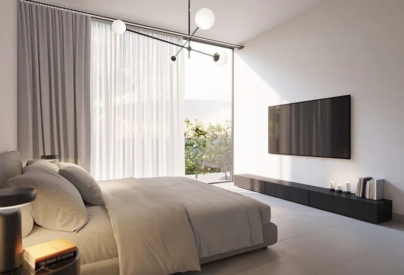 Render of a Safa apartment bedroom with a bed in neutral linen, sheer curtains and a wall-mounted television