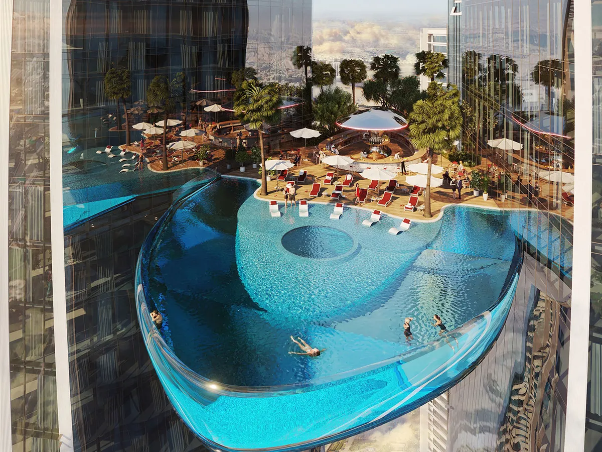 Render of the curved infinity pool and sun deck inside the Ruby Heart of Safa Two, seen from above