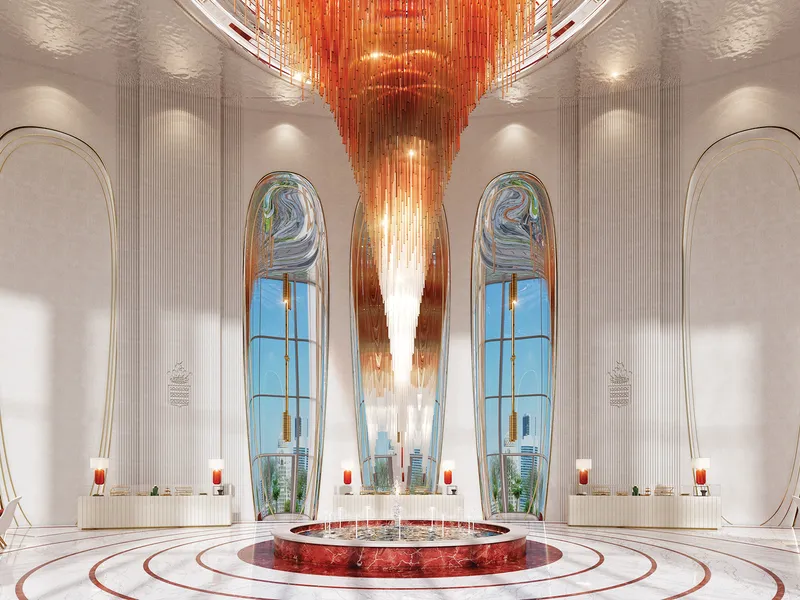 Interior render of the Safa Two lobby with a red central feature, arched windows and a patterned stone floor