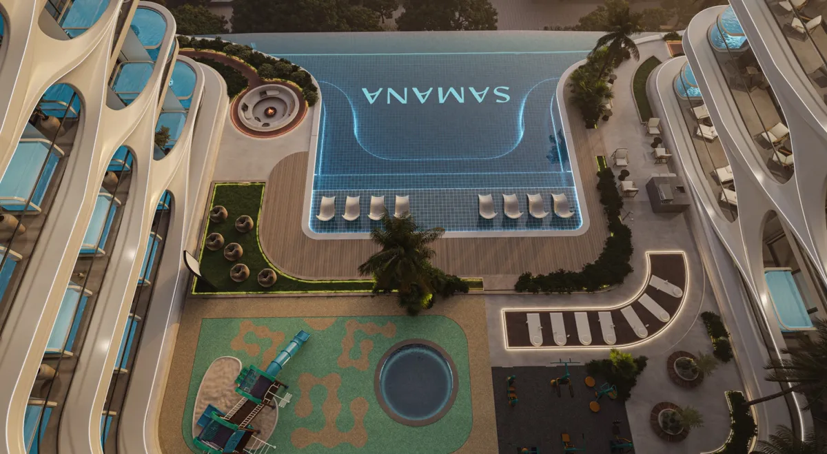 Aerial render of the pool deck, kids' pool and play area between the wings of Samana Boulevard Heights