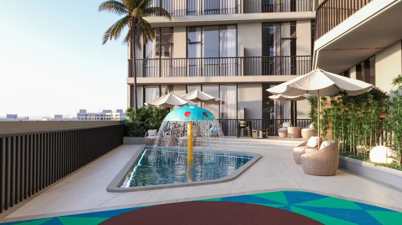 Render of the kids' pool with a fountain on the podium deck at Samana Greenfield 2