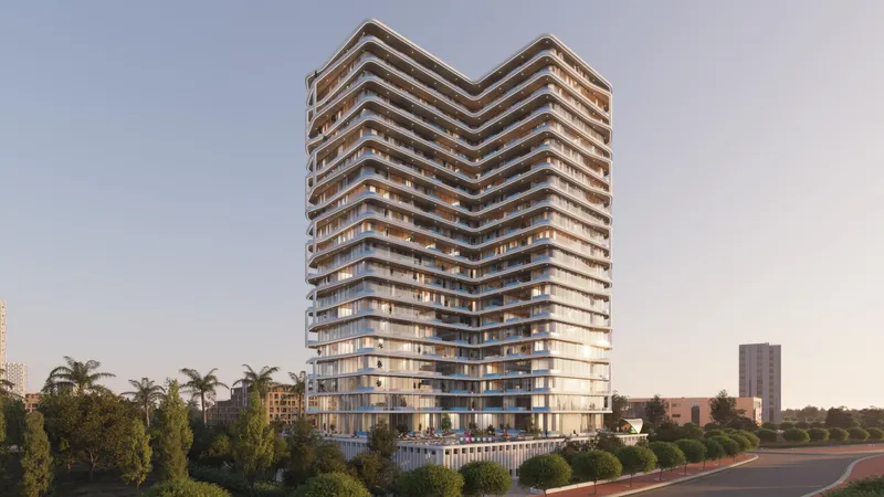 Render of the Samana Ibiza residential tower in Dubailand Residence Complex at dusk