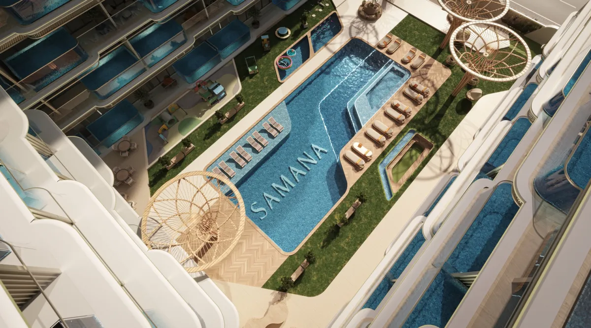 Aerial render of the swimming pool and garden deck between the wings of Samana Imperial Garden