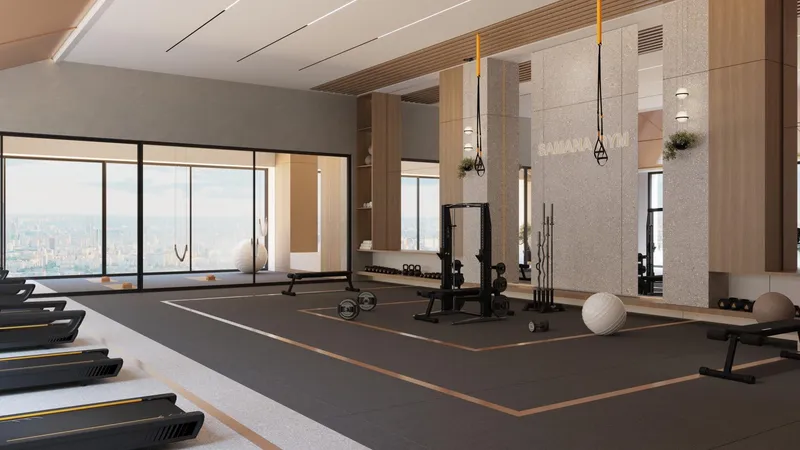 Render of the gym with city views at Samana Resorts