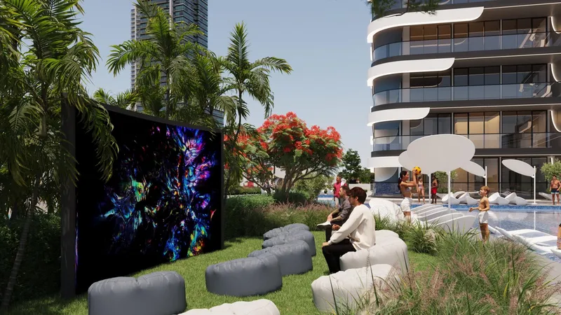 Render of the outdoor cinema screen and seating beside the pool at Samana Resorts