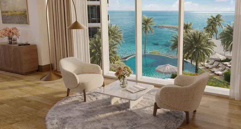 Render of a lounge at Seef Residences overlooking the pool, the beach and the sea