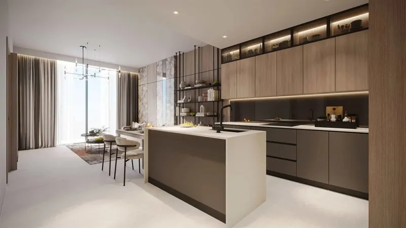 Fitted kitchen with an island, breakfast bar and timber cabinets in a Serene Gardens II apartment