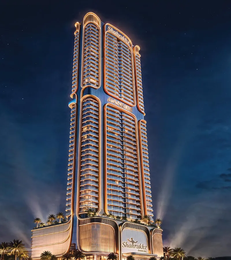 Render of Shahrukhz Residences lit at night, with the podium and waterfront at its base