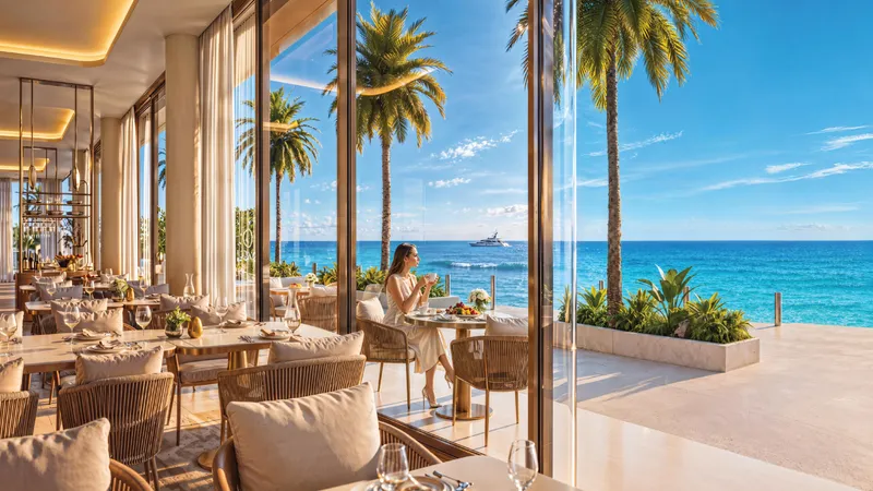 Restaurant terrace on the waterfront promenade at Shahrukhz Residences by Danube, looking out to sea