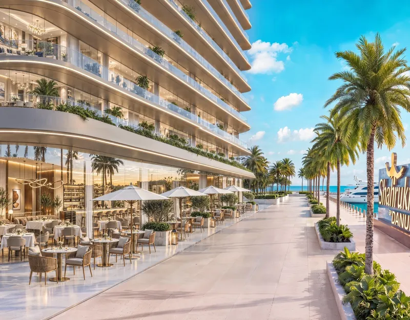 Render of the waterfront promenade with shops and restaurants beneath Shahrukhz Residences